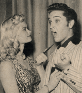 Irish McCalla (TV's Sheena), threadening Elvis with a knife!